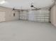 Spacious two-car garage with ample storage at 2402 Cumberland Cliff Dr, Ruskin, FL 33570