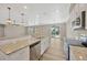 Spacious kitchen with island and granite countertops at 2402 Cumberland Cliff Dr, Ruskin, FL 33570