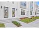 Front view of townhouses with modern design and landscaping at 2506 W Cleveland St # 18, Tampa, FL 33609