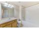 Clean bathroom, featuring a shower/tub combo, vanity, and toilet at 26519 Castleview Way, Wesley Chapel, FL 33544