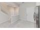 Kitchen with stainless steel appliances and light wood cabinets at 26519 Castleview Way, Wesley Chapel, FL 33544