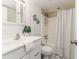Clean bathroom with a shower/tub combo and updated vanity at 2736 Haverhill Ct # 2736, Clearwater, FL 33761