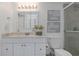 Bathroom with white vanity, toilet and shower at 2736 Haverhill Ct # 2736, Clearwater, FL 33761
