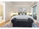 King-size bed in bright bedroom with sliding glass doors to balcony at 2736 Haverhill Ct # 2736, Clearwater, FL 33761