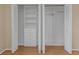 White built-in closet with shelves, drawers and hanging rod at 2736 Haverhill Ct # 2736, Clearwater, FL 33761