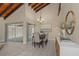 Spacious dining area features a wooden table, chairs, and stylish decor at 2736 Haverhill Ct # 2736, Clearwater, FL 33761