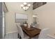 Dining room features a wood table, chandelier, and artwork at 2736 Haverhill Ct # 2736, Clearwater, FL 33761
