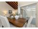 Dining area with wooden table and view of the backyard at 2736 Haverhill Ct # 2736, Clearwater, FL 33761