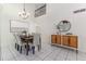 Elegant dining room with a chandelier and modern sideboard at 2736 Haverhill Ct # 2736, Clearwater, FL 33761