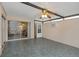 Enclosed patio with tile floor, ceiling fan and access to living room at 2736 Haverhill Ct # 2736, Clearwater, FL 33761