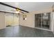 Enclosed patio with tile flooring, ceiling fan, and access to dining area at 2736 Haverhill Ct # 2736, Clearwater, FL 33761