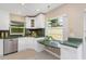 Modern kitchen, featuring white cabinets and green countertops at 2736 Haverhill Ct # 2736, Clearwater, FL 33761