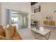 Spacious living room with a leather couch, a coffee table, and patio access at 2736 Haverhill Ct # 2736, Clearwater, FL 33761