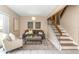 Living room features gray sofa and access to a patio at 2736 Haverhill Ct # 2736, Clearwater, FL 33761