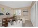 Home office with wood desk, comfortable chairs, and natural light at 2736 Haverhill Ct # 2736, Clearwater, FL 33761