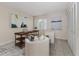 Bright office space with wood desk and two armchairs at 2736 Haverhill Ct # 2736, Clearwater, FL 33761