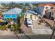 Aerial view of a waterfront home with RV parking and solar panels at 316 16Th Ave, Indian Rocks Beach, FL 33785