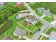 Aerial view showing a house with a backyard and a pond nearby at 3238 Mela Ct, Holiday, FL 34691