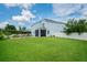 Spacious backyard with lush lawn and gazebo at 3238 Mela Ct, Holiday, FL 34691