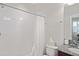 Clean bathroom with shower and white tile at 3238 Mela Ct, Holiday, FL 34691