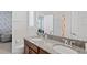 Double vanity bathroom with granite countertop at 3238 Mela Ct, Holiday, FL 34691