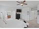 Main bedroom with ensuite bathroom access and walk-in closet at 3238 Mela Ct, Holiday, FL 34691