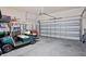 Spacious garage with golf cart and ample storage space at 3238 Mela Ct, Holiday, FL 34691