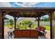 Relaxing gazebo with seating area in backyard at 3238 Mela Ct, Holiday, FL 34691