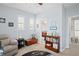 ' play area with seating and built-in bookshelves at 3238 Mela Ct, Holiday, FL 34691