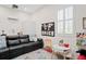 ' playroom featuring a comfy couch, art area, and plenty of storage at 3238 Mela Ct, Holiday, FL 34691