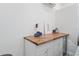 Playroom with a built-in wood countertop and white cabinets at 3238 Mela Ct, Holiday, FL 34691