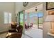 Relaxing screened porch accessible from the Gathering room at 3238 Mela Ct, Holiday, FL 34691