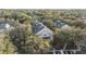 Aerial view showing building location and surrounding trees at 3270 Haviland Ct # 304, Palm Harbor, FL 34684