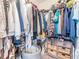 Large walk-in closet with double hanging rods and shelving at 3270 Haviland Ct # 304, Palm Harbor, FL 34684