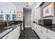 Modern community kitchen with stainless steel appliances and granite countertops at 3270 Haviland Ct # 304, Palm Harbor, FL 34684