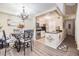 Kitchen and dining area with chandelier and modern decor at 3270 Haviland Ct # 304, Palm Harbor, FL 34684