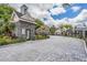 Gated entrance to the community with landscaping at 3270 Haviland Ct # 304, Palm Harbor, FL 34684