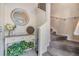 Bright entryway with stairs and decorative console table at 3270 Haviland Ct # 304, Palm Harbor, FL 34684