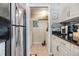 Small laundry closet with washer and dryer hookups at 3270 Haviland Ct # 304, Palm Harbor, FL 34684