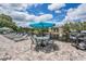 Enjoy resort-style amenities with grilling stations and lounge chairs by the lake at 3270 Haviland Ct # 304, Palm Harbor, FL 34684