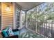 Relaxing screened balcony with comfortable seating and tranquil views at 3270 Haviland Ct # 304, Palm Harbor, FL 34684