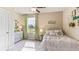 Cozy bedroom with a full bed and decorative wall art at 36033 Sunflower Hill Dr, Zephyrhills, FL 33541
