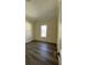 Cozy bedroom with ample natural light, new flooring and neutral walls at 3729 Winward Lakes Dr, Tampa, FL 33611