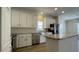 Beautiful kitchen featuring an island, stainless steel appliances, and modern cabinetry at 3729 Winward Lakes Dr, Tampa, FL 33611