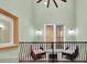 Balcony with seating for two and a glass-top table at 3817 W Dale Ave # 2, Tampa, FL 33609
