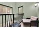 Relaxing balcony with wicker chair and small table at 3817 W Dale Ave # 2, Tampa, FL 33609