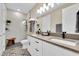 Modern bathroom with double vanity and walk-in shower at 3817 W Dale Ave # 2, Tampa, FL 33609