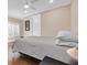 Simple bedroom with hardwood floors and private door at 3817 W Dale Ave # 2, Tampa, FL 33609