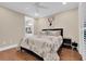 Cozy bedroom with hardwood floors and a ceiling fan at 3817 W Dale Ave # 2, Tampa, FL 33609