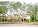 Three-unit building with lush landscaping at 3817 W Dale Ave # 2, Tampa, FL 33609